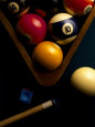 Billiard Balls, Chalk, Cue, and Rack on Table Felt