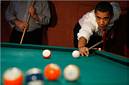 Barack Obama playing pool