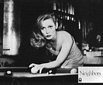 Faye Dunaway playing pool