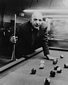 Telly Savalas playing pool